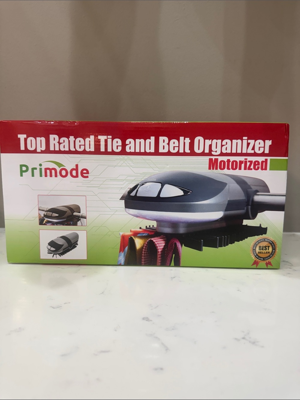 Motorized tie and belt rack